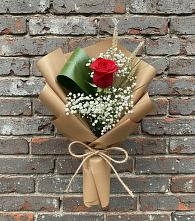Букет цветов из:  Розы в Комаровском